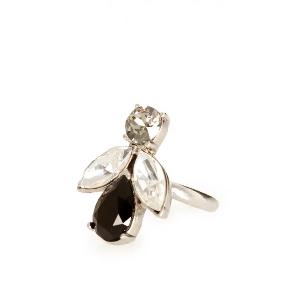 Oscar De La Renta ring with black, smoke-grey, and clear tear-shaped crystals.